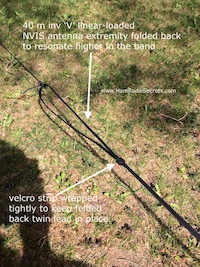 Picture shows the twin lead folded back on itself at the extremities of VE2DPE's portable 40 m inverted 'V' linear-loaded NVIS antenna to increase its resonant frequency.