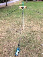 Picture shows a NVIS antenna (linear-loaded dipole) being tested with an antenna analyzer.