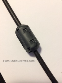 Ferrite RF choke closed on RG8X coax Ferrite RF choke closed on RG8X coax
